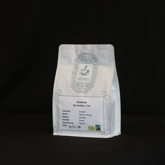Eine weiße 250g-Tüte mit Honduras-Kaffee aus der Rösterei Mundus in Düren